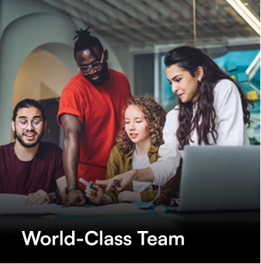 Diverse team collaborating around a laptop