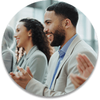 Professionals applauding during a meeting
