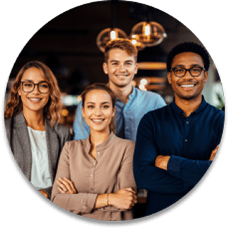 Team of four professionals smiling together