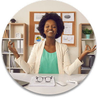 Professional smiling at her desk